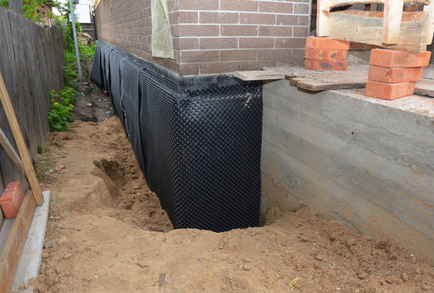Happy homeowners after waterproofing job in Springtown
